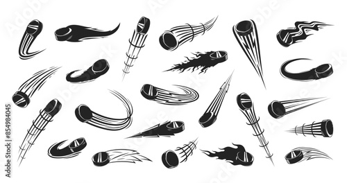 Vector black and white flying ice hockey pucks with motion trails
