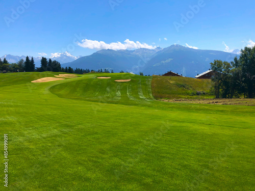 Wallpaper Mural Golf Course with Hole 7 and Mountain View in Crans Montana, Valais, Switzerland. Torontodigital.ca