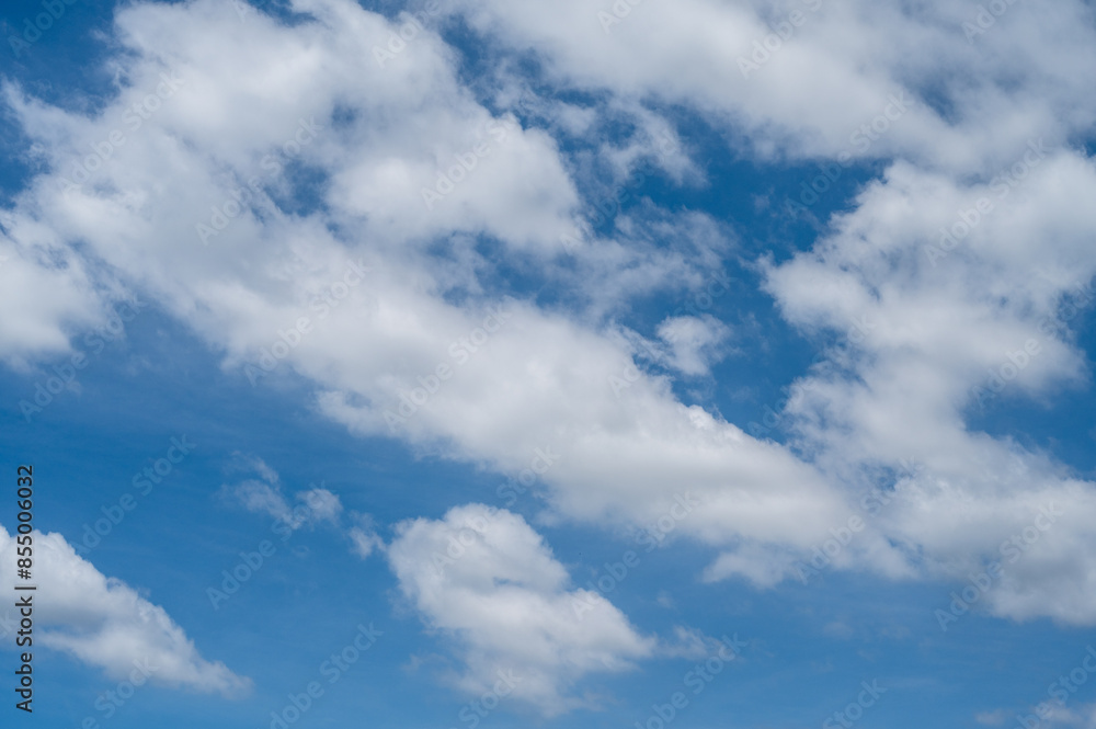 The sky was clear and blue with scattered clouds. The sky was clear and blue with scattered clouds.