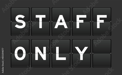Black color analog flip board with word staff only on gray background