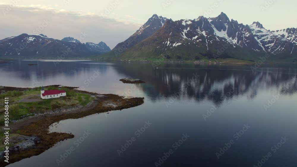 Fantastic aerial shot over the Austnesfjorden fjord and its great mountains at golden hour. Lofoten, Norway. Fantastic aerial shot over the Austnesfjorden fjord and its great mountains at golden hour. Lofoten, Norway.