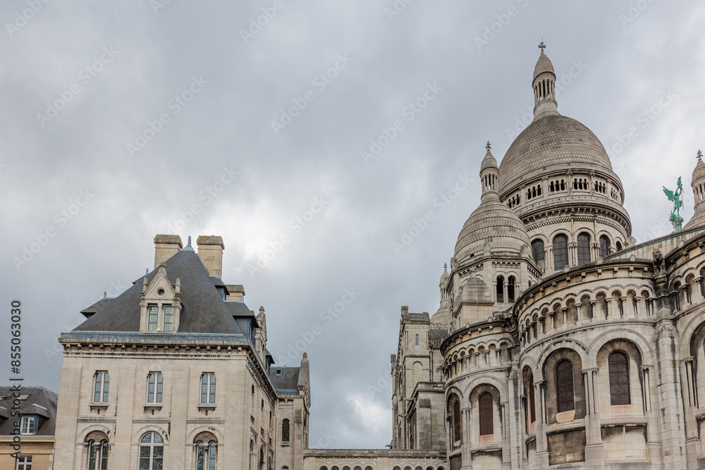 Sacré-coeur basilica standing tall under cloudy sky in paris france Sacré-coeur basilica standing tall under cloudy sky in paris france