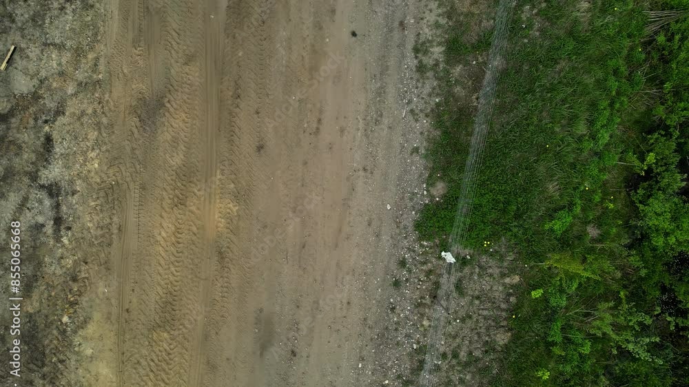 custom made wallpaper toronto digitalAerial drone top down shot over an empty dirt road with road been constructed on it at daytime.