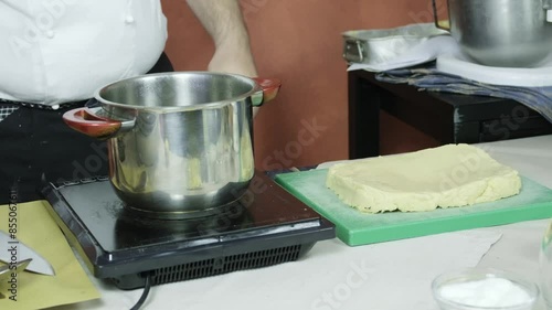 chef preparing panelle typical Sicilian Italian street fried food snack photo