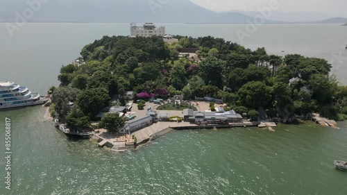 Upward panning drone footage of Nanzhao Amorous Island photo