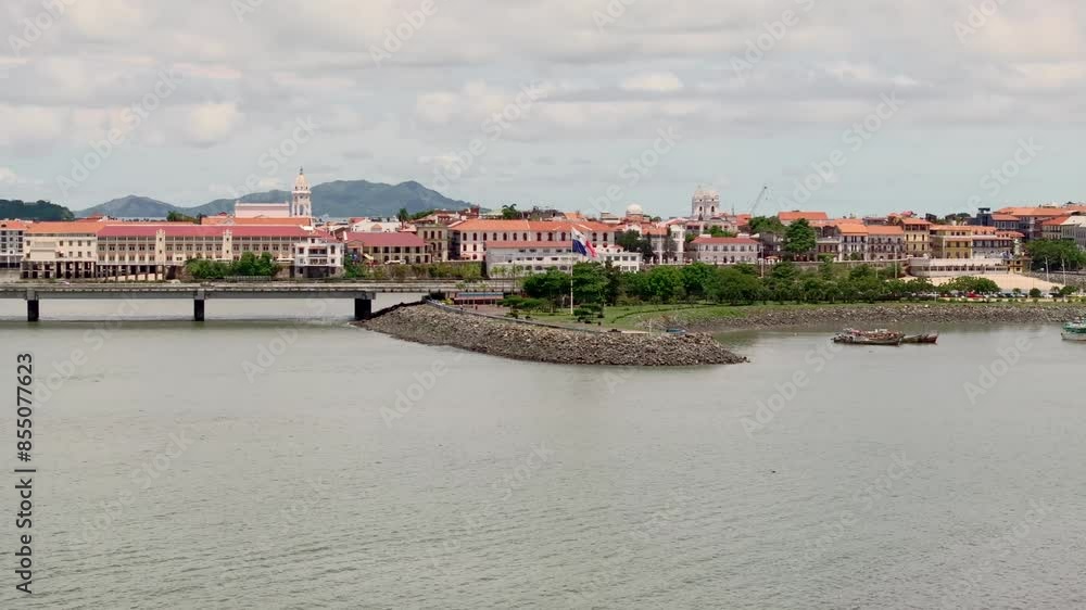 Panama flag with casco antiguo and Amador causeway in the background Panama flag with casco antiguo and Amador causeway in the background