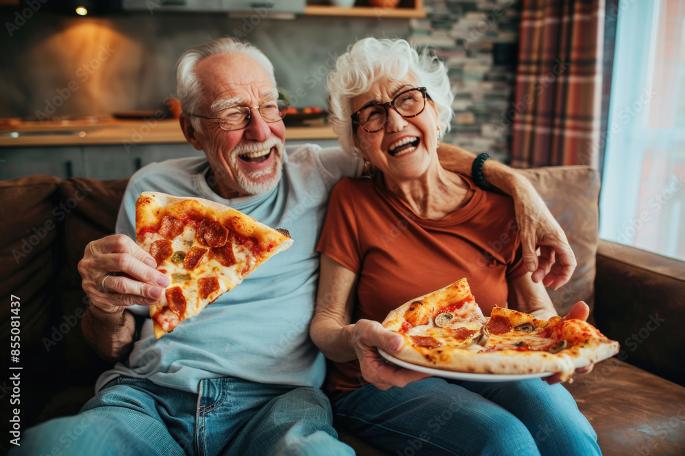 Portrait of happy senior couple eating pizza and enjoying evening at home Portrait of happy senior couple eating pizza and enjoying evening at home