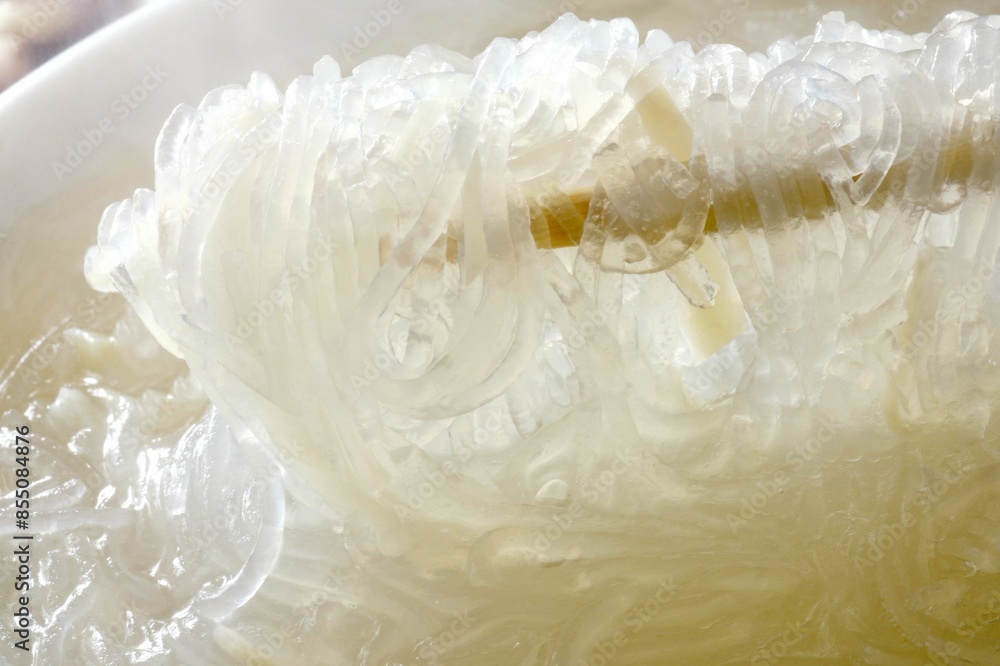Fototapeta premium Winter noodles picked up with chopsticks It is a common snack in Taiwan