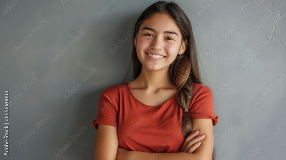 Young smiling attractive woman on grey studio background Young smiling attractive woman on grey studio background