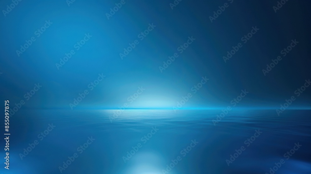 A calm ocean stretches under a twilight sky, bathed in shades of blue. A calm ocean stretches under a twilight sky, bathed in shades of blue.