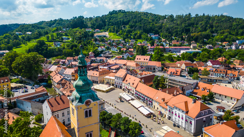 This cozy city of Samobor is beautifully captured from above, showcasing its charming streets, historic buildings, and lush greenery. Known for its picturesque old town and vibrant cultural life