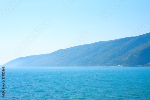 blue sea and mountains in the background, seascape on a summer day