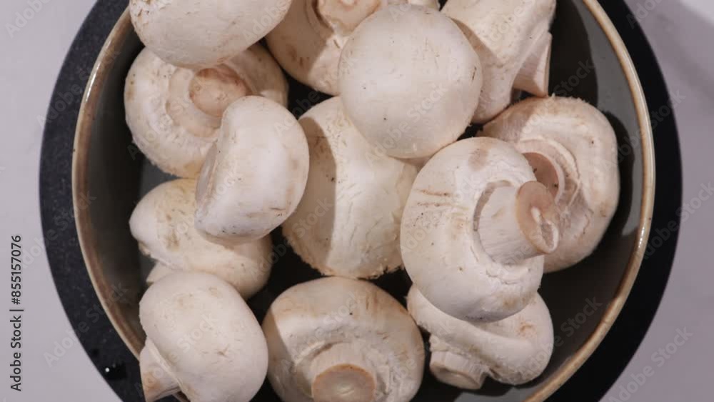 mushrooms close up whole on plate food rotation mushrooms close up whole on plate food rotation