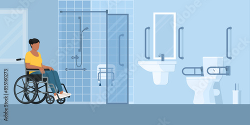 Woman in a wheelchair in an accessible bathroom