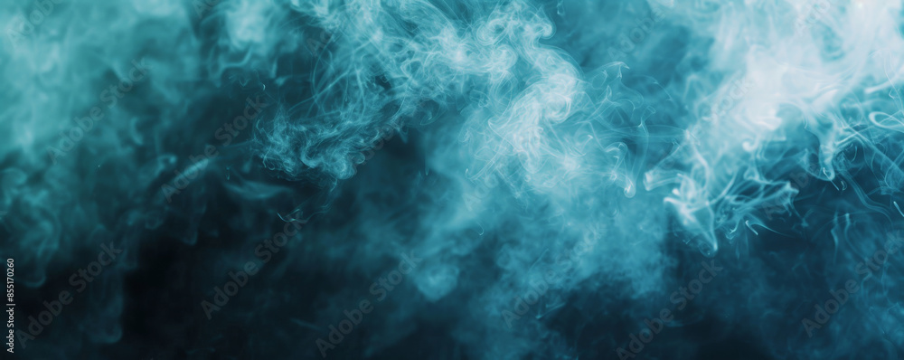 Smoke background with soft, sky blue smoke against a dark background. Smoke background with soft, sky blue smoke against a dark background.