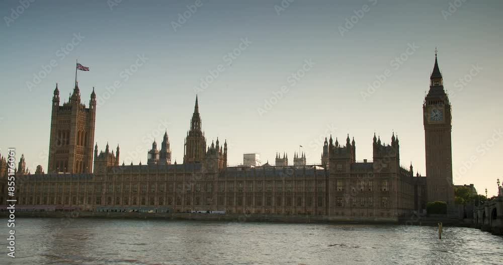 Big Ben and the Houses of Parliament alongside the River Thames at dusk, London, England Big Ben and the Houses of Parliament alongside the River Thames at dusk, London, England