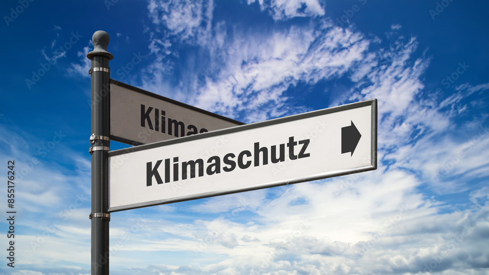 Fototapeta premium Signposts the direct way to climate protection