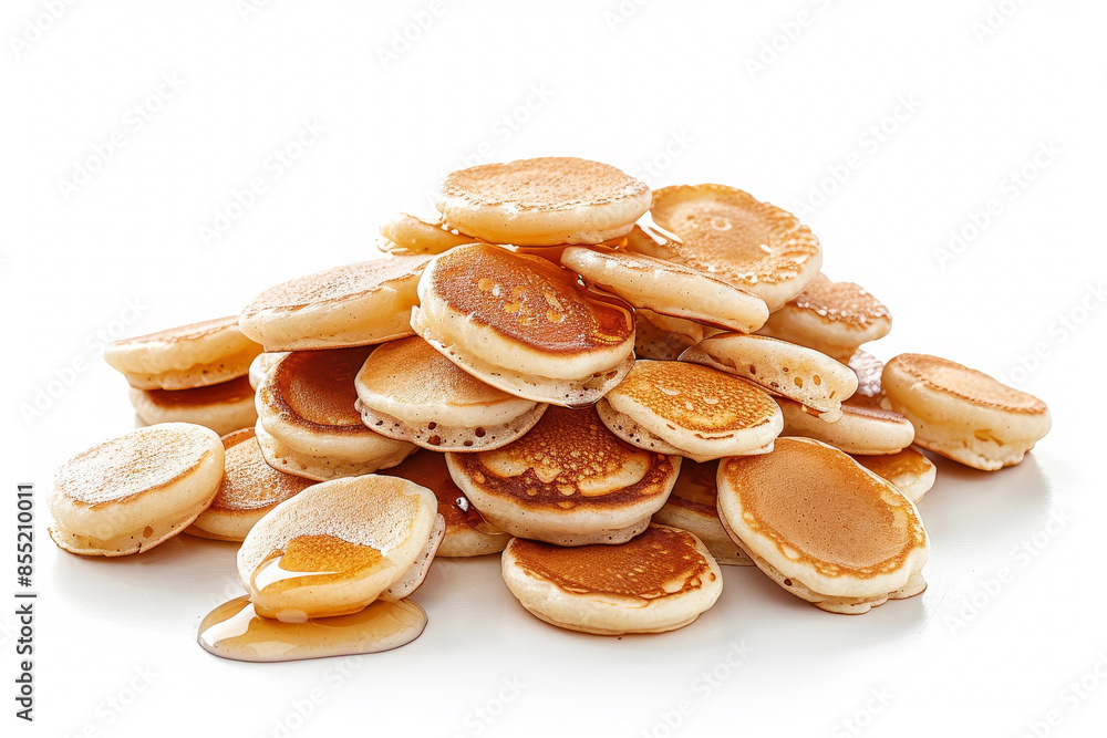 A pile of pancakes with syrup on top A pile of pancakes with syrup on top