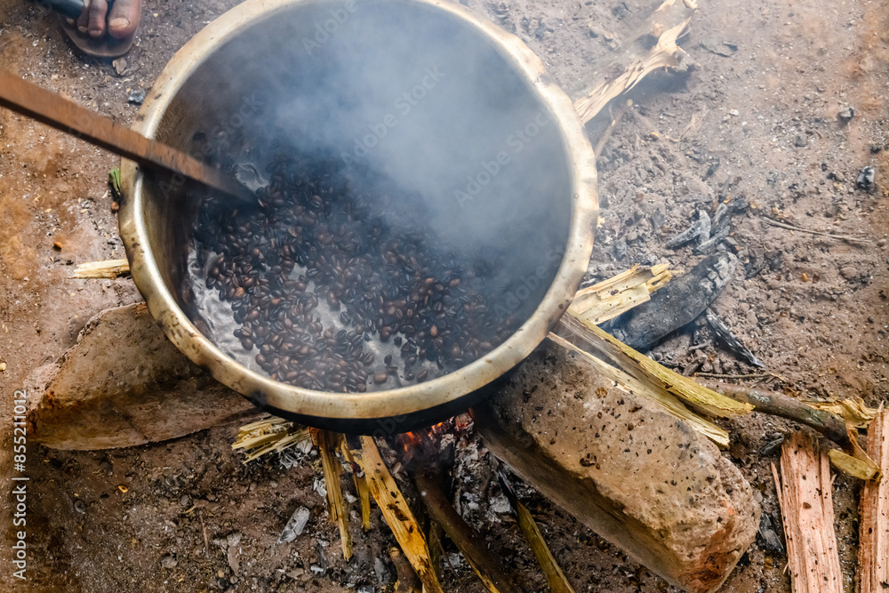 Roasting coffee beans in Chagga tribe Roasting coffee beans in Chagga tribe