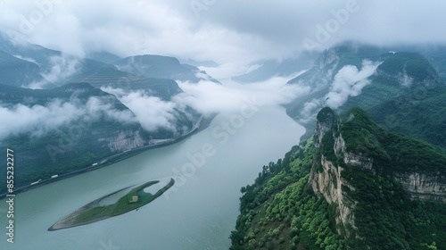 In summer the Yangtze River rolls in and flows along, capturing the serene beauty of the river landscape in China photo