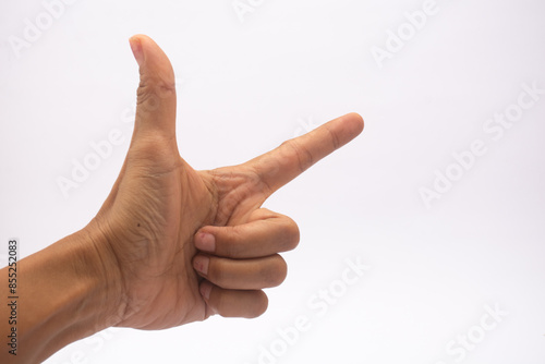 A woman's hand shows a check mark on her finger. it can also show the number seven symbol or a pose for a photo, point to a direction or something. photo