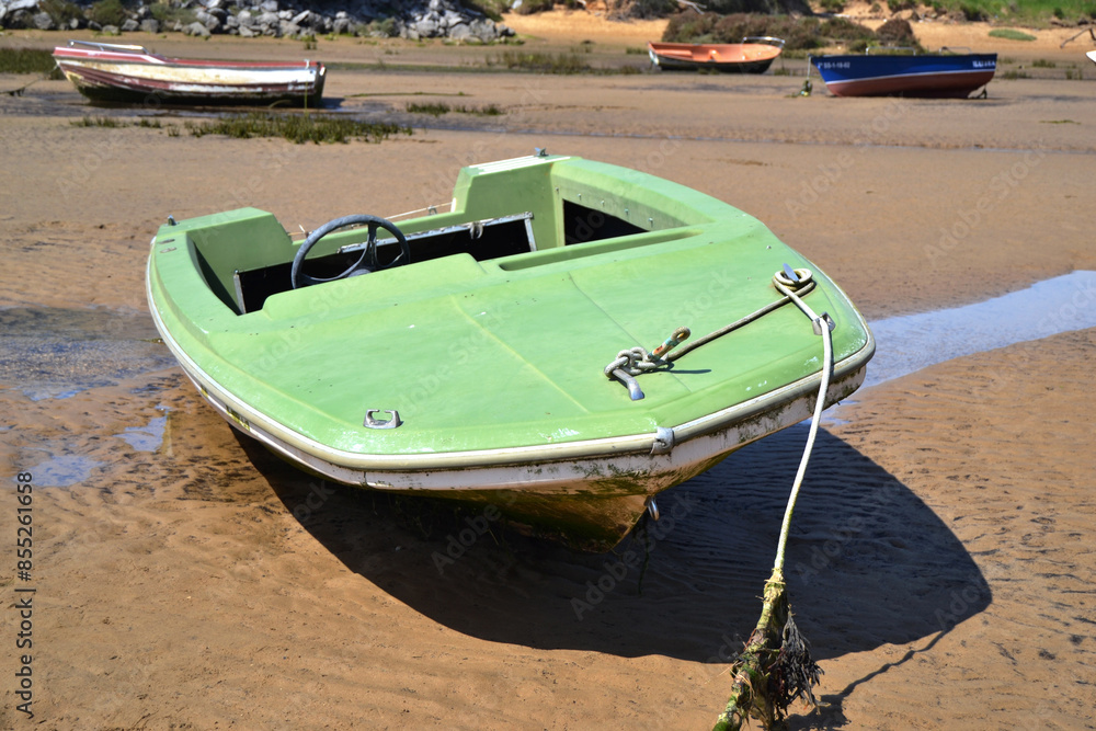 abandoned boat on the beach, in Cantabria abandoned boat on the beach, in Cantabria