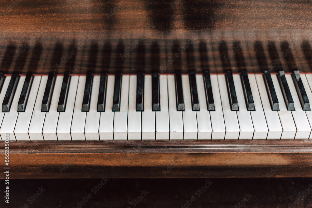 Brown wooden piano keyboard Brown wooden piano keyboard
