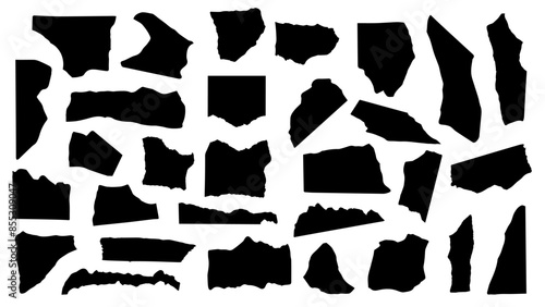 set of black silhouettes pieces of ripped paper scrap. torn sheets of paper clippings.	