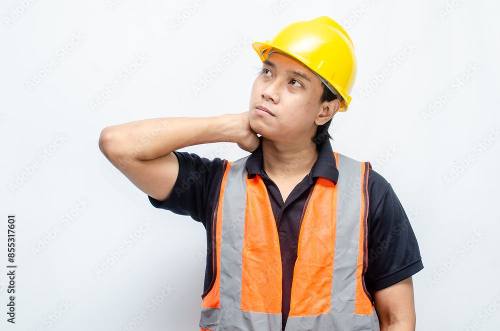 Title
young asian man construction worker using yellow helmet and orange vest makes a thinking gesture. asian male worker in pensive expression while thinking looking for idea. Title
young asian man construction worker using yellow helmet and orange vest makes a thinking gesture. asian male worker in pensive expression while thinking looking for idea.