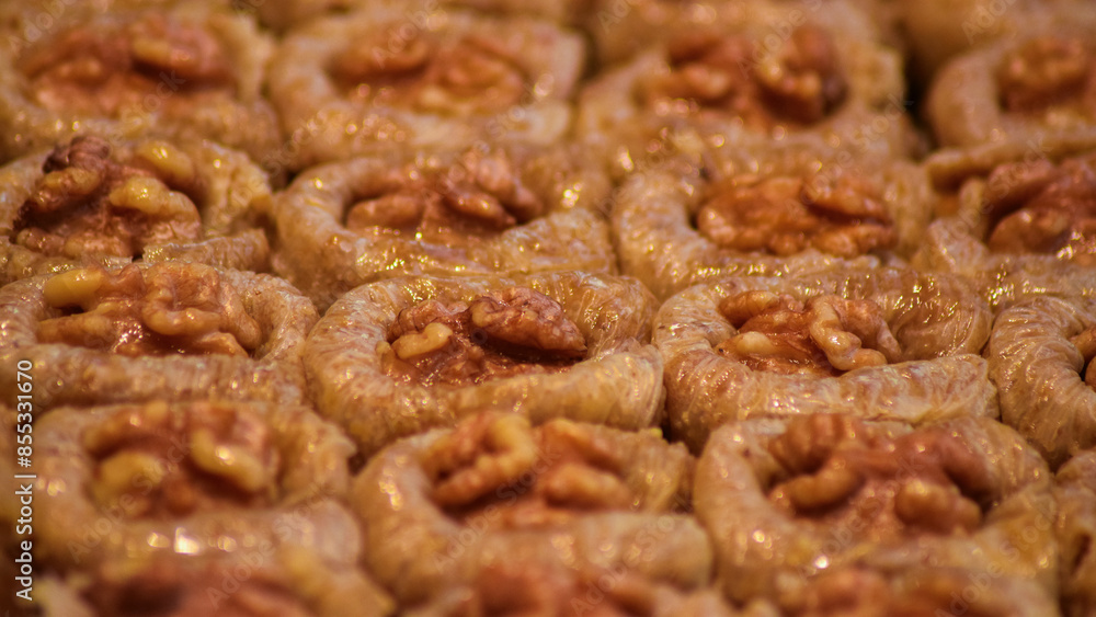 Turkish traditional dessert baklava with pistachio and walnut close up Turkish traditional dessert baklava with pistachio and walnut close up