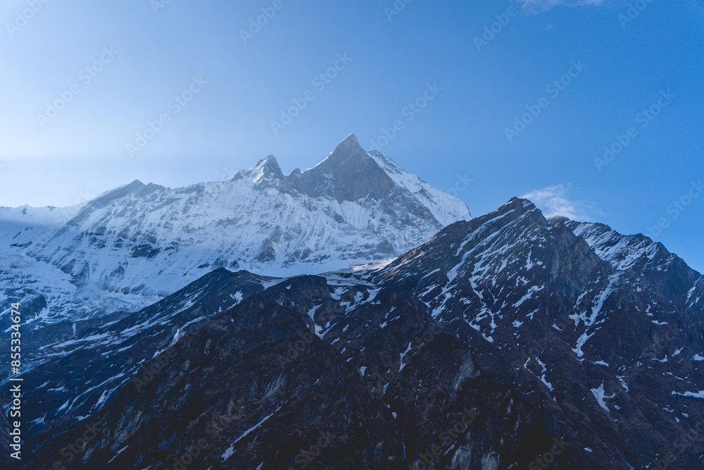 Stunning View of Machapuchare Mountain in the Himalayas, The Sacred Mountain of Nepal Stunning View of Machapuchare Mountain in the Himalayas, The Sacred Mountain of Nepal