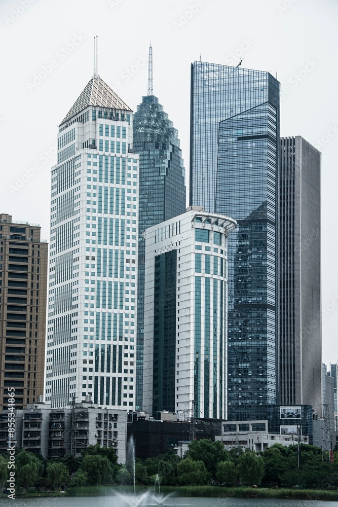 Vertical shot of modern skyscrapers in an urban cityscape Vertical shot of modern skyscrapers in an urban cityscape