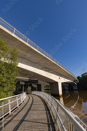 Walkway under motorway bridge crossing the Brunswick River photo