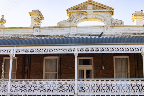 Rustic ironwork along balcony of historic building in Armidale NSW photo