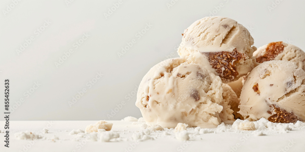 Fototapeta premium An image of artistic vanilla and fig gelato, its creamy texture and chunks of fig against a white backdrop, perfect for showcasing the combination of classic and exotic flavors in a high-end dessert