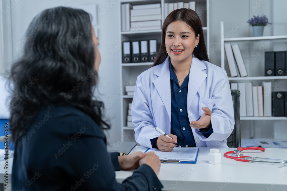 During a consultation in the office, female patients received advice on options and engaged in discussions about their overall health and treatment plans. This interaction between medical professional During a consultation in the office, female patients received advice on options and engaged in discussions about their overall health and treatment plans. This interaction between medical professional