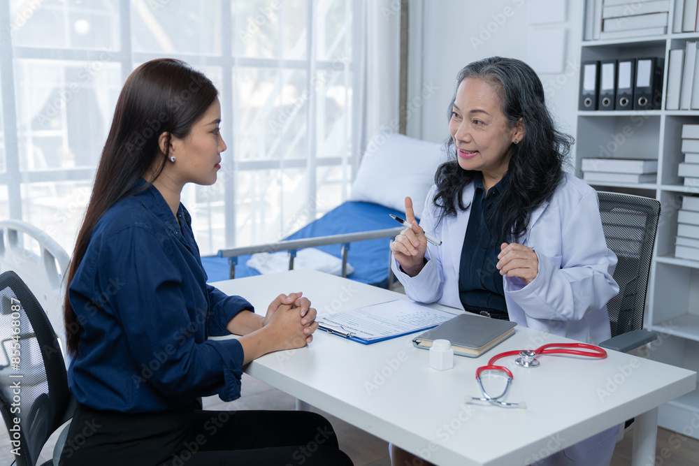 During a consultation in the office, female patients received advice on options and engaged in discussions about their overall health and treatment plans. This interaction between medical professional During a consultation in the office, female patients received advice on options and engaged in discussions about their overall health and treatment plans. This interaction between medical professional