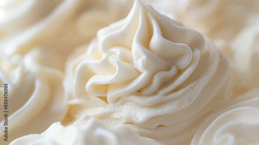 Obraz premium Classic vanilla ice cream swirl, a closeup of classic vanilla ice cream swirls, their creamy texture and soft color against a white background