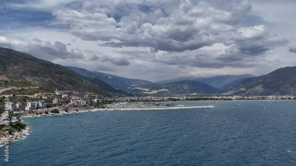 Drone view with the movement of vehicles and sea views on a wonderful coastline Drone view with the movement of vehicles and sea views on a wonderful coastline