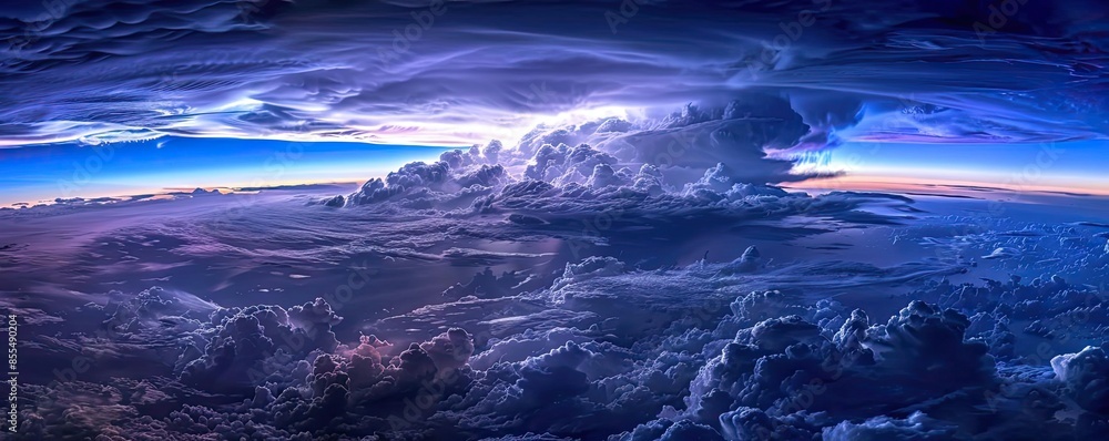 Fototapeta premium Dramatic aerial view of storm clouds over the horizon at sunset, showcasing the beauty and intensity of nature's elements in vivid colors and textures.
