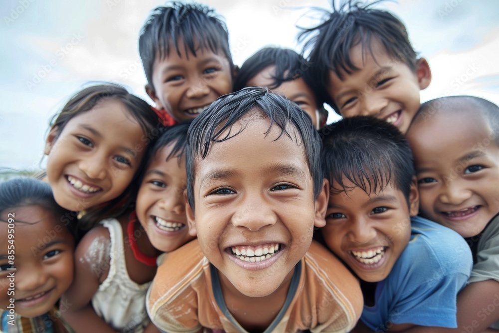 Portrait of happy group of Asian children smiling and looking at camera Portrait of happy group of Asian children smiling and looking at camera