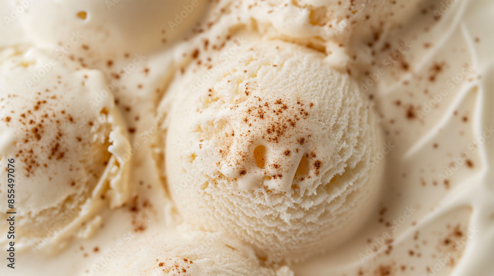 A closeup image of decadent bourbon vanilla bean ice cream, its creamy texture and speckled appearance highlighted against a pure white background A closeup image of decadent bourbon vanilla bean ice cream, its creamy texture and speckled appearance highlighted against a pure white background