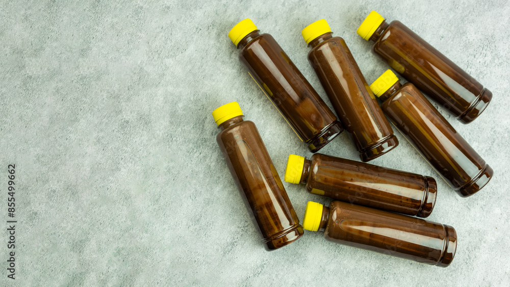 Many bottles of chocolate milk with yellow lid. A order for delivery Many bottles of chocolate milk with yellow lid. A order for delivery