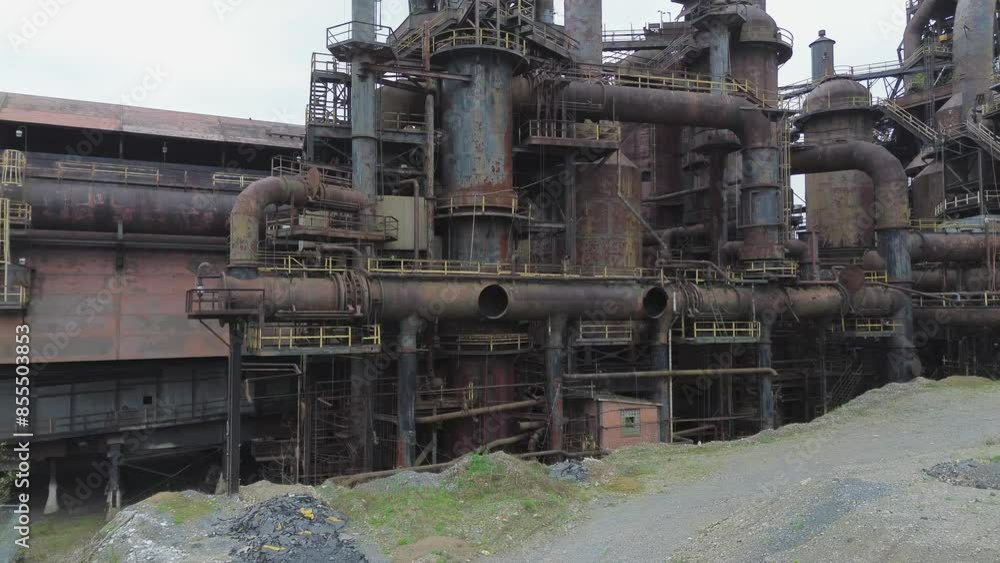 Abandoned blast furnaces in Bethlehem PA. Shot is a close up truck shot from left to right of the rear side of the structure. Abandoned blast furnaces in Bethlehem PA. Shot is a close up truck shot from left to right of the rear side of the structure.