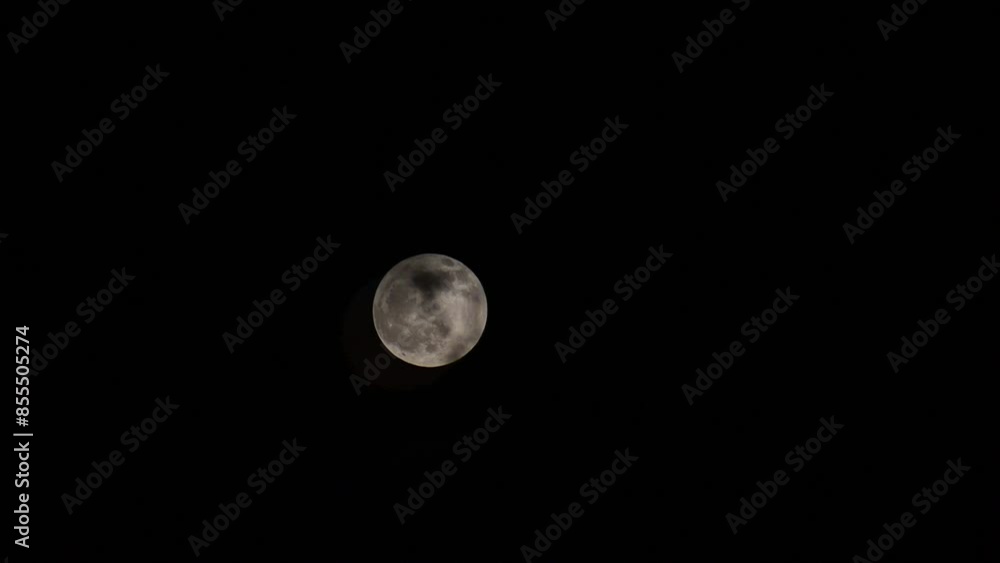 Full moon in the black sky. The night sky. Full moon in the black sky. The night sky.