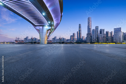 Fototapeta Naklejka Na Ścianę i Meble -  Asphalt road and bridge with modern city buildings scenery at night in Guangzhou
