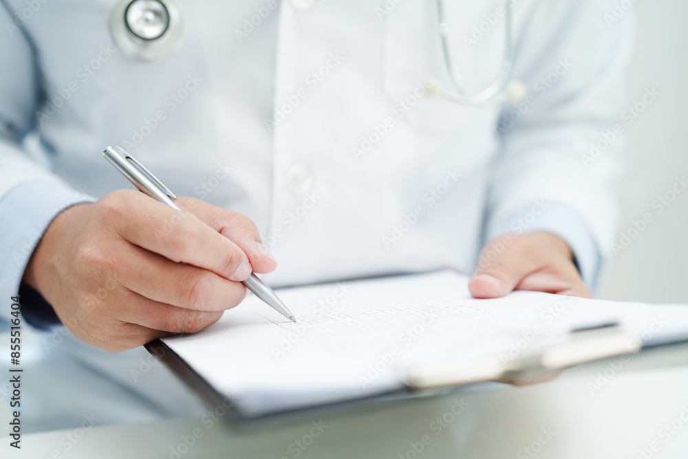 Asian man doctor study document to research method and technic for treating patients. Asian man doctor study document to research method and technic for treating patients.