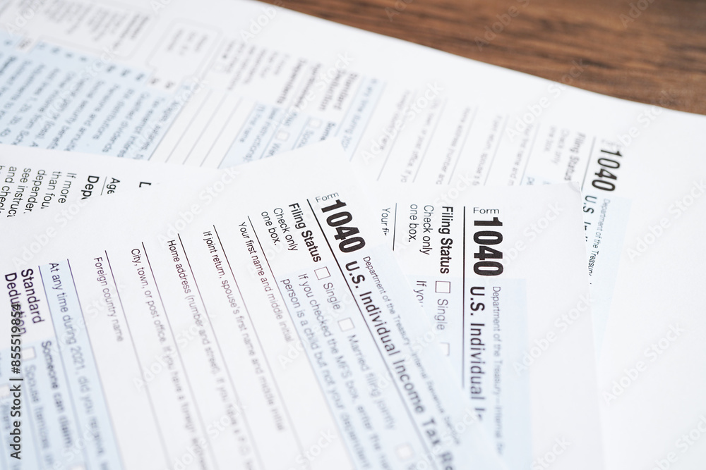 Tax form 1040 U.S. Individual Income Tax Return, business finance concept. Tax form 1040 U.S. Individual Income Tax Return, business finance concept.