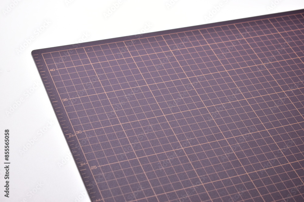 black cutting mat board on white background with line and scale measure guide pattern for object art design, tool equipment of diy craft work black cutting mat board on white background with line and scale measure guide pattern for object art design, tool equipment of diy craft work