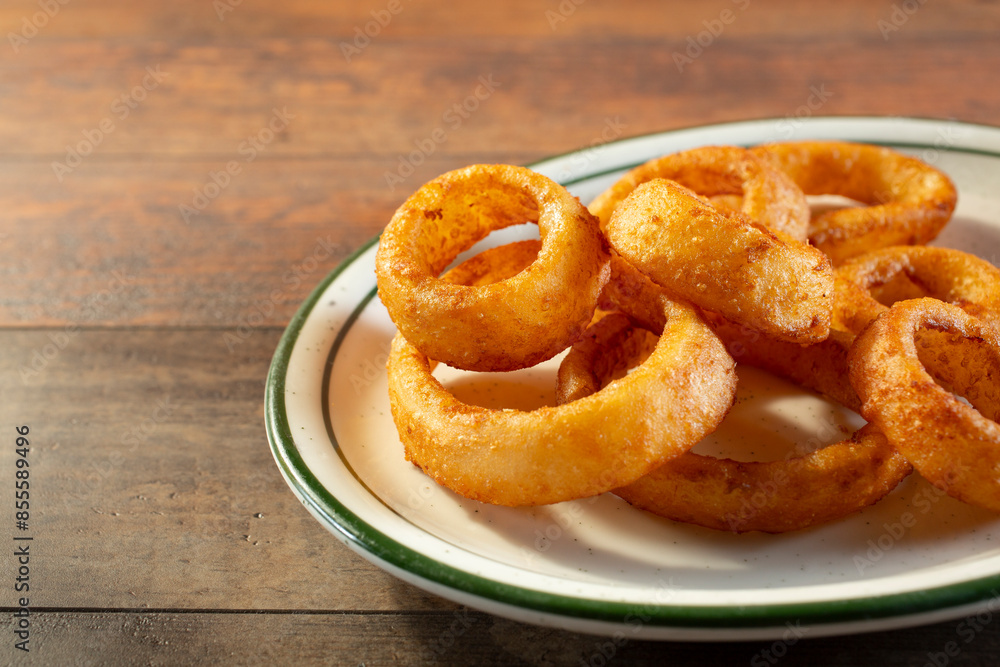 A view of a plate of onion rings. A view of a plate of onion rings.
